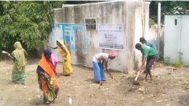 Workers cleaned the community toilet in Bakhri..