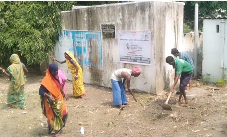 Workers cleaned the community toilet in Bakhri..